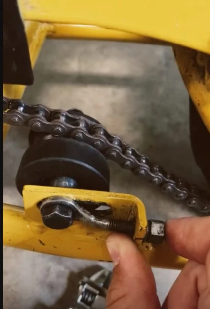 adjusting the chain tension